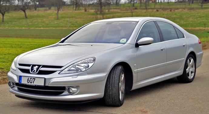 My former car, a nice comfy not-so-Mustachian Peugeot 607 V6 (photo credit: Taxiarchos228, Wikimedia Commons, CC BY 3.0)