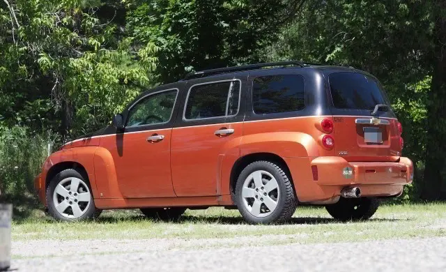 The car of personal finance blogger 'Physician on FIRE': a 2006 two-tone Chevy HHR