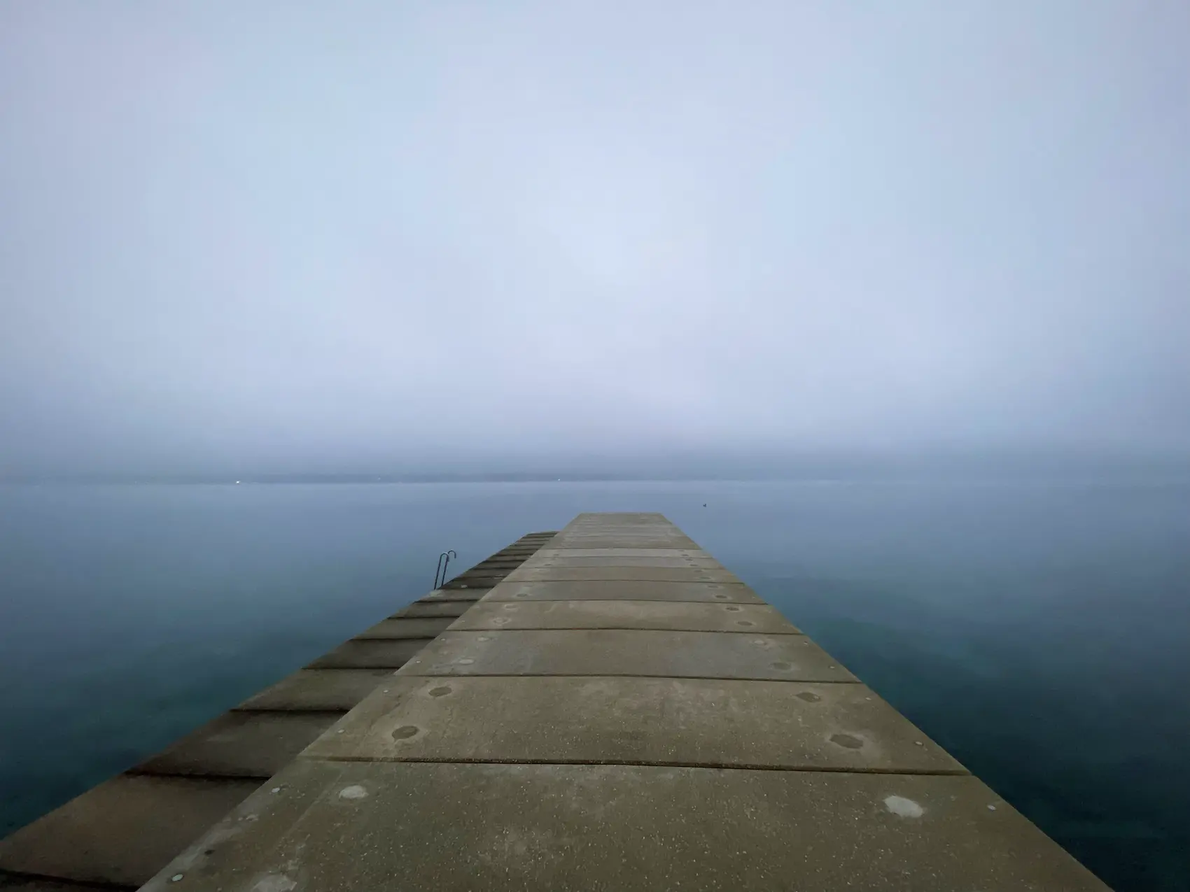 A pier disappearing into the fog on Lake Geneva: that's how it felt the day I learned the CHF 180'000 was gone